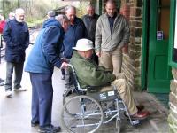 Staff and volunteers practicing step assistance