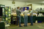 Roger Desforges (centre) and Mark Simon (right) chat to a visitor.