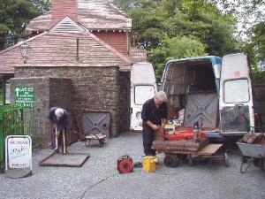 Surrey Area Group members at Woody Bay preparing the tank panels for galvanisation in July 2006