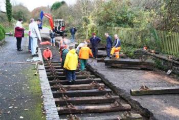 L &amp; B volunteers laying track at Torrington Station   