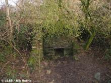 An old permanent way hut remains near Snapper