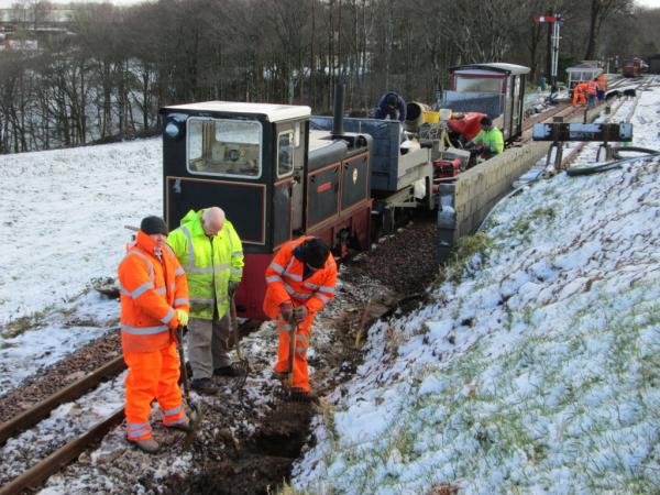 Digging a drainage channel, 13th February 2014